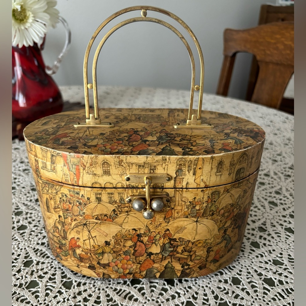 Vintage Anton Pieck wooden decoupaged oval wooden purse with brass handle.